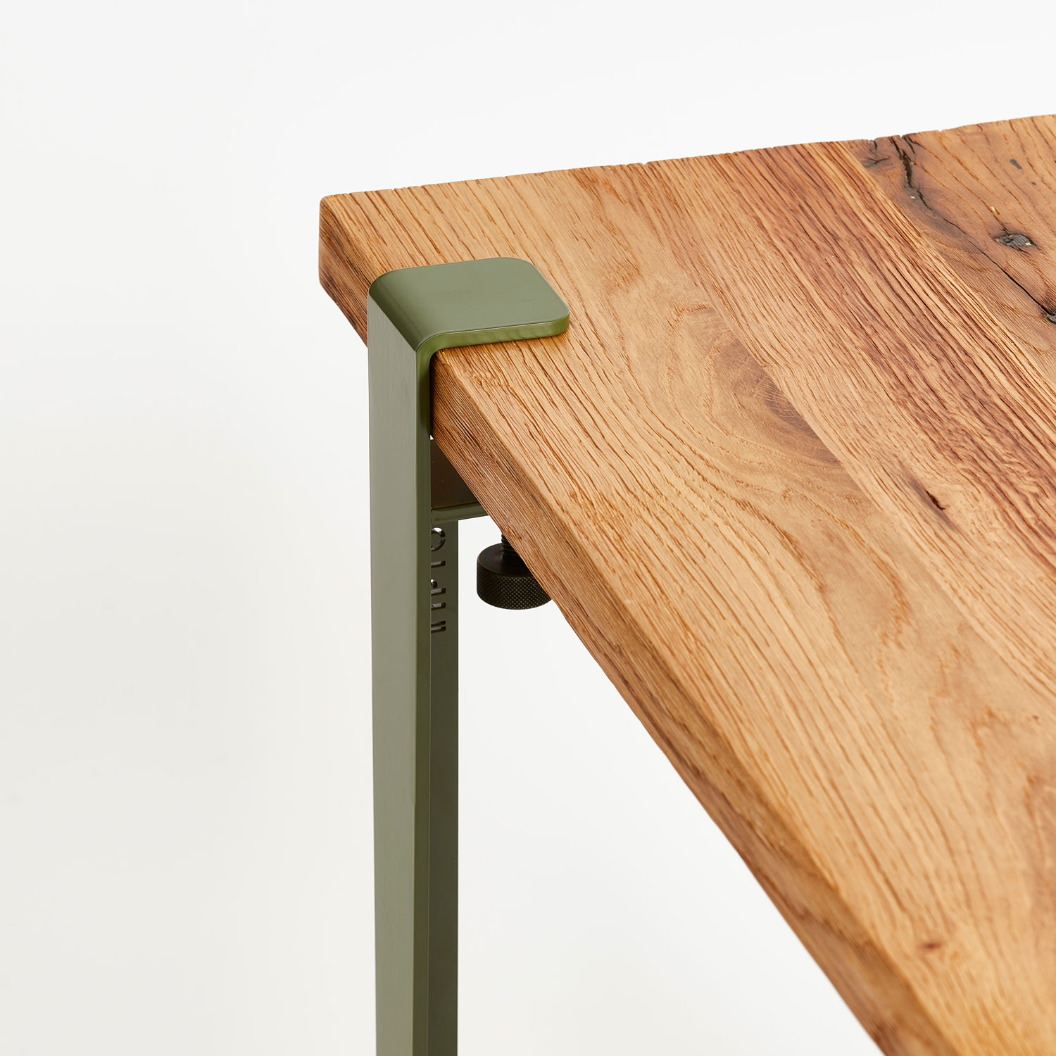 Reclaimed wood table top with green steel legs